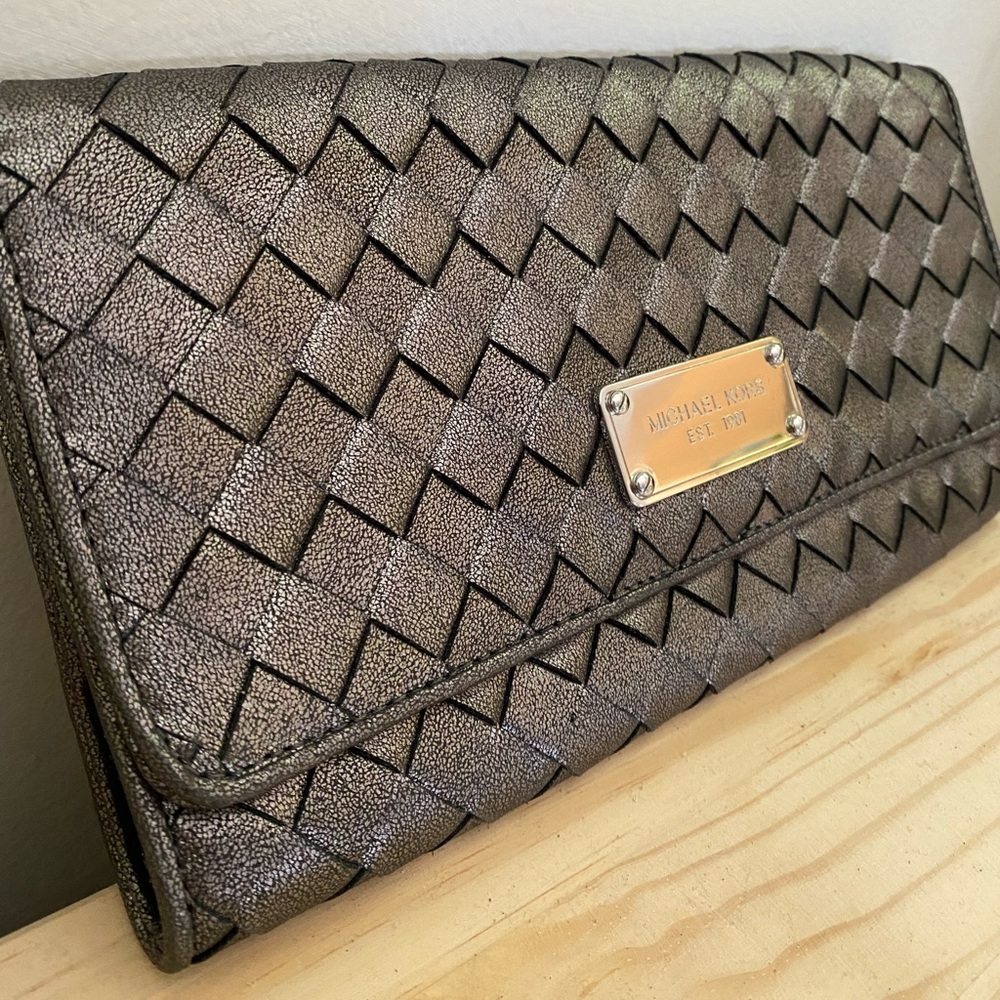 Michel Kors woven leather clutch in gun metal